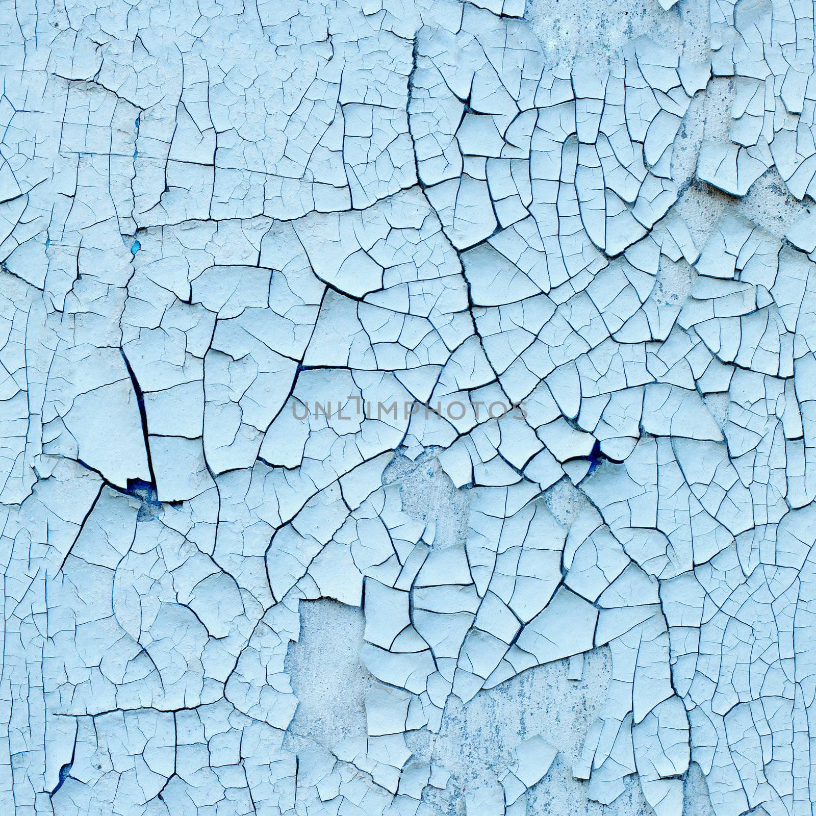 Wall covered with old enamel with a cracks - seamless texture