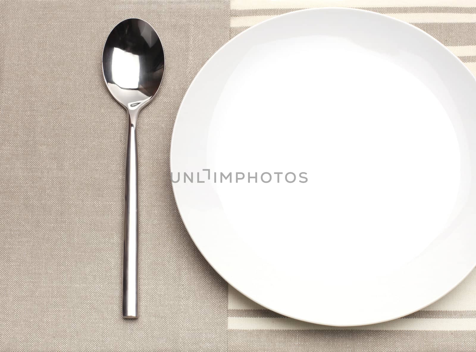 empty plate with spoon