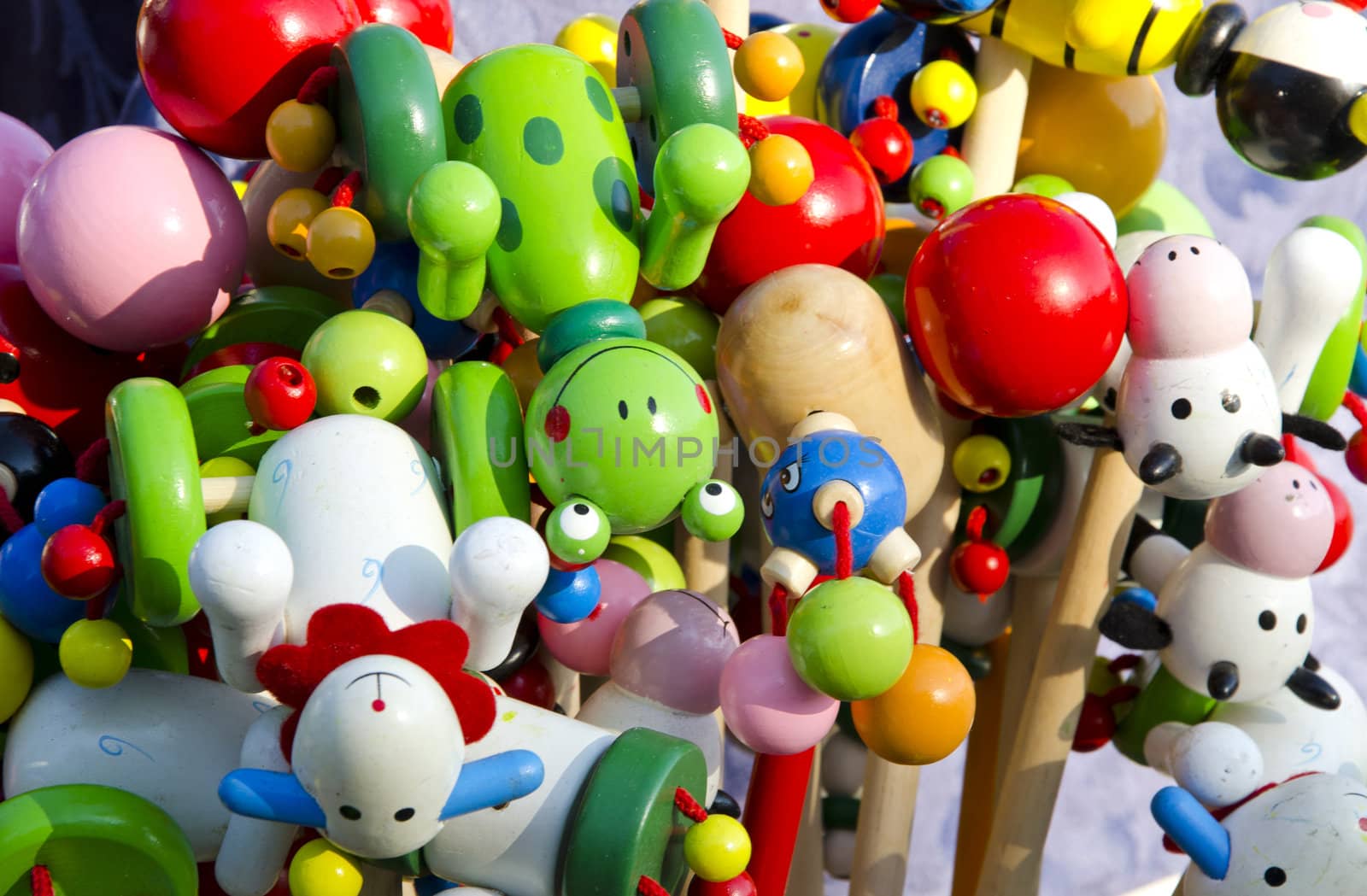 Closeup of interesting colorful wooden toys sold in fair trade.