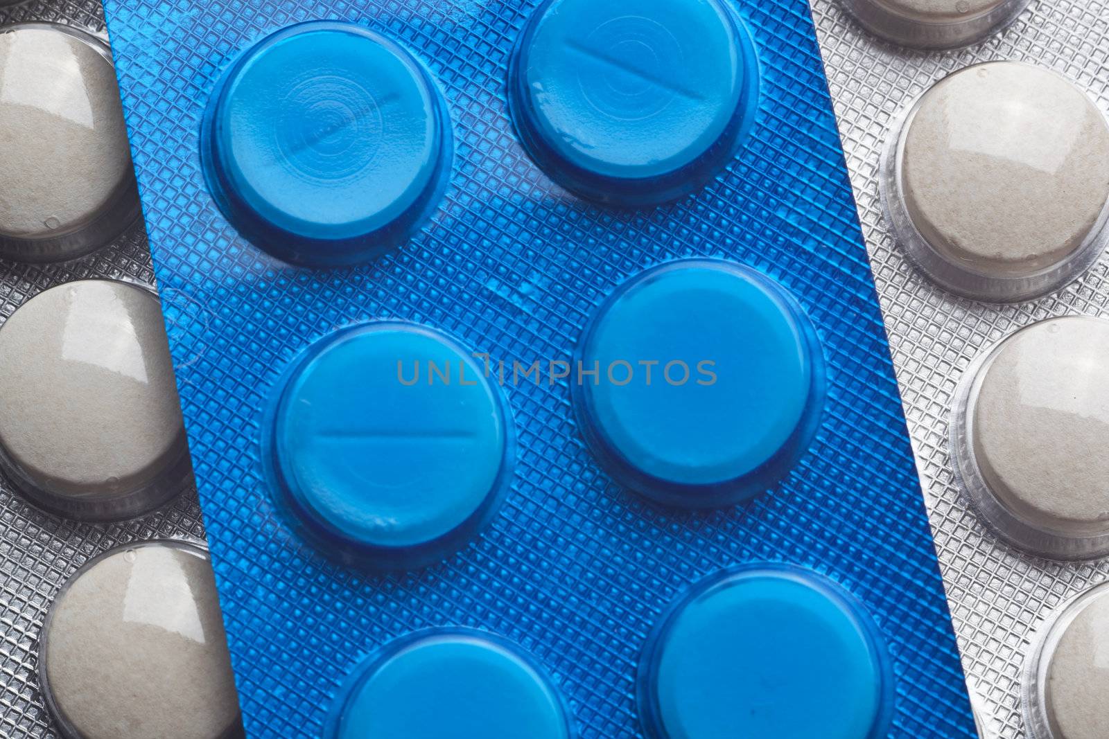 Silver Pills On Metal Table Background, copy space
