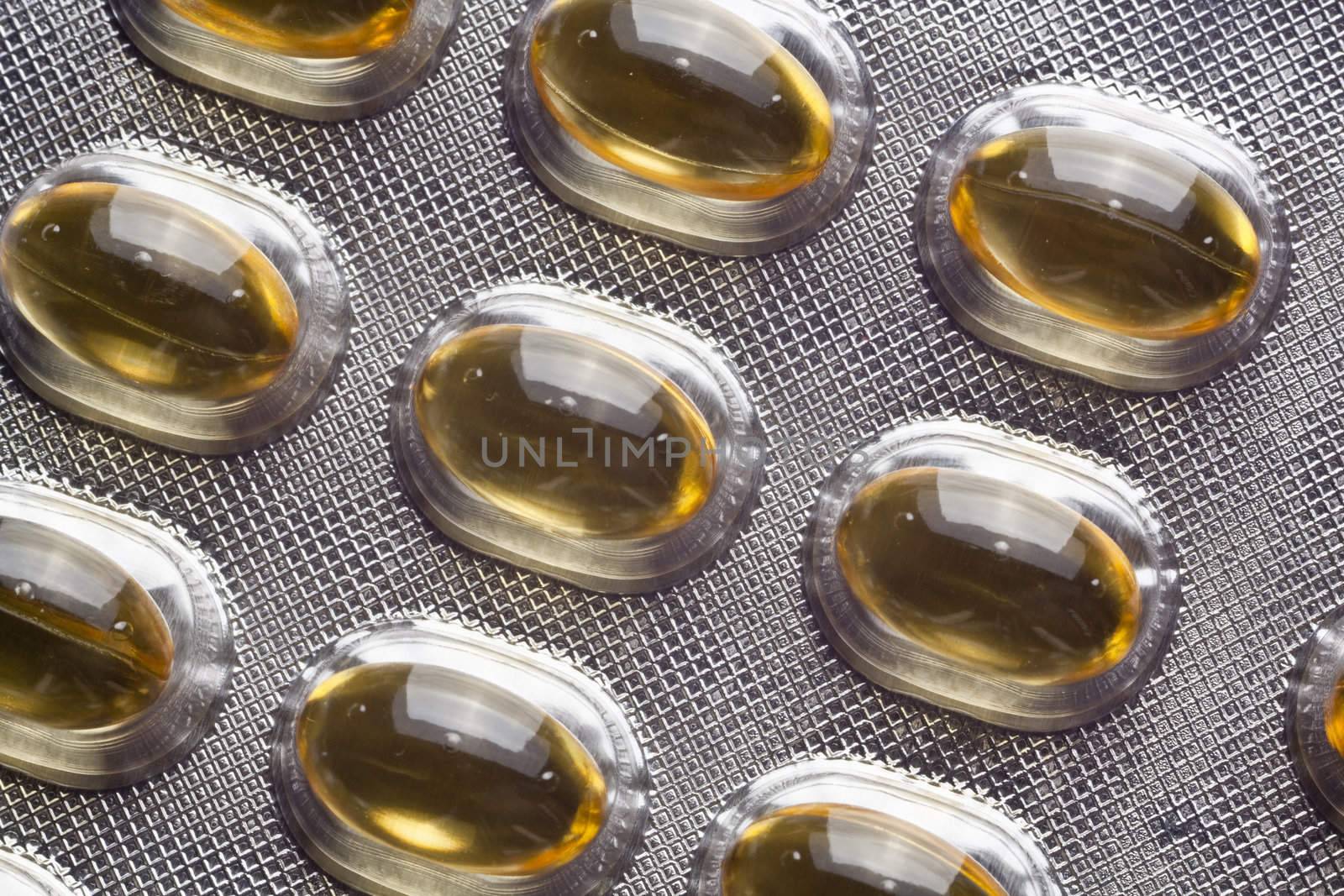 Oil Pills On Metal Table Background, copy space