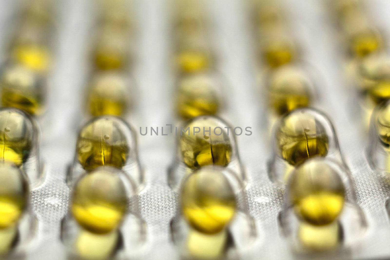 Silver Pills On Metal Table Background, copy space