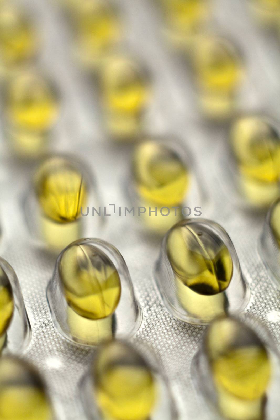 Fish Oil Pills On Metal Table Background, copy space