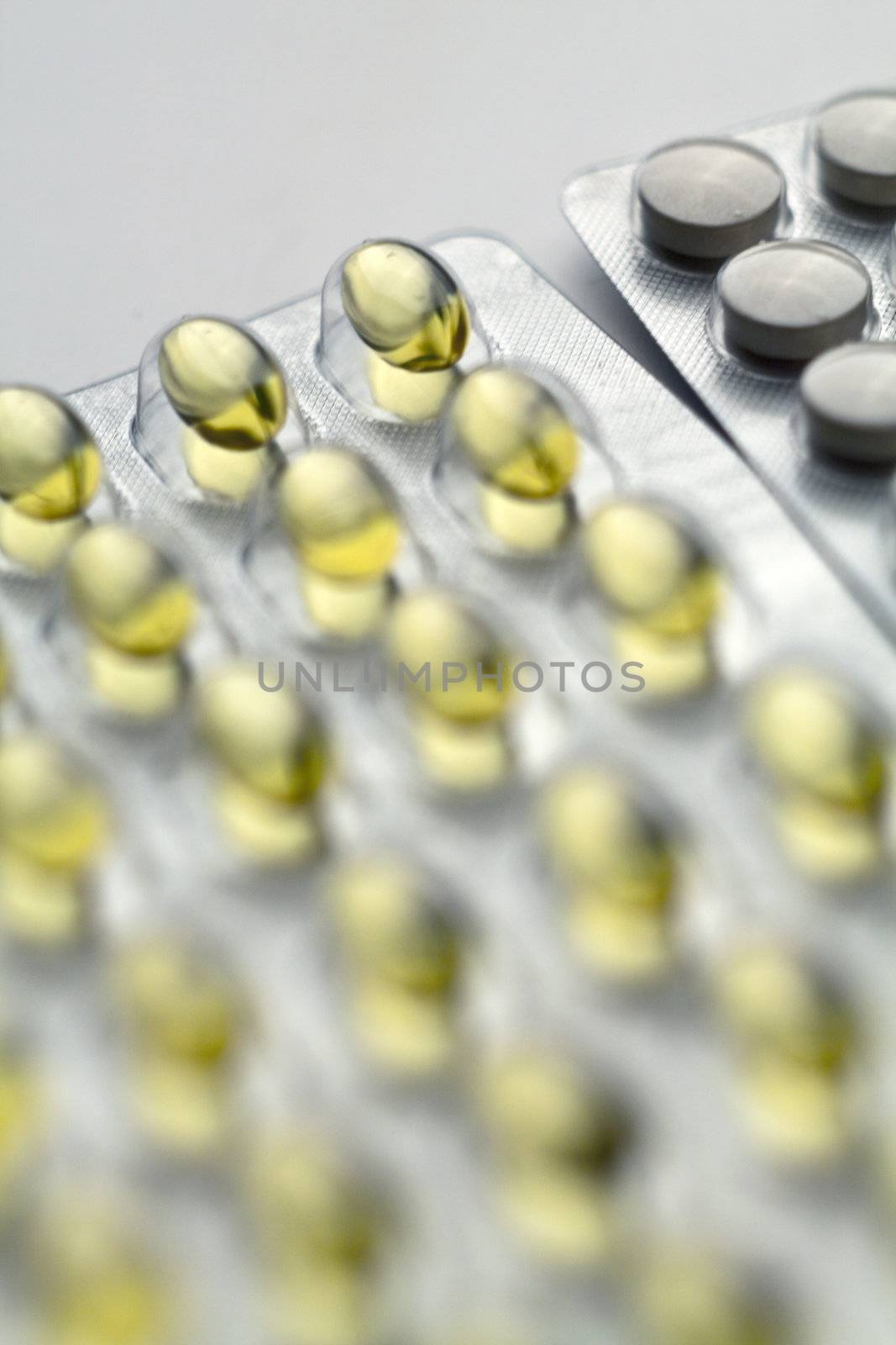 Silver Pills On Metal Table Background, copy space