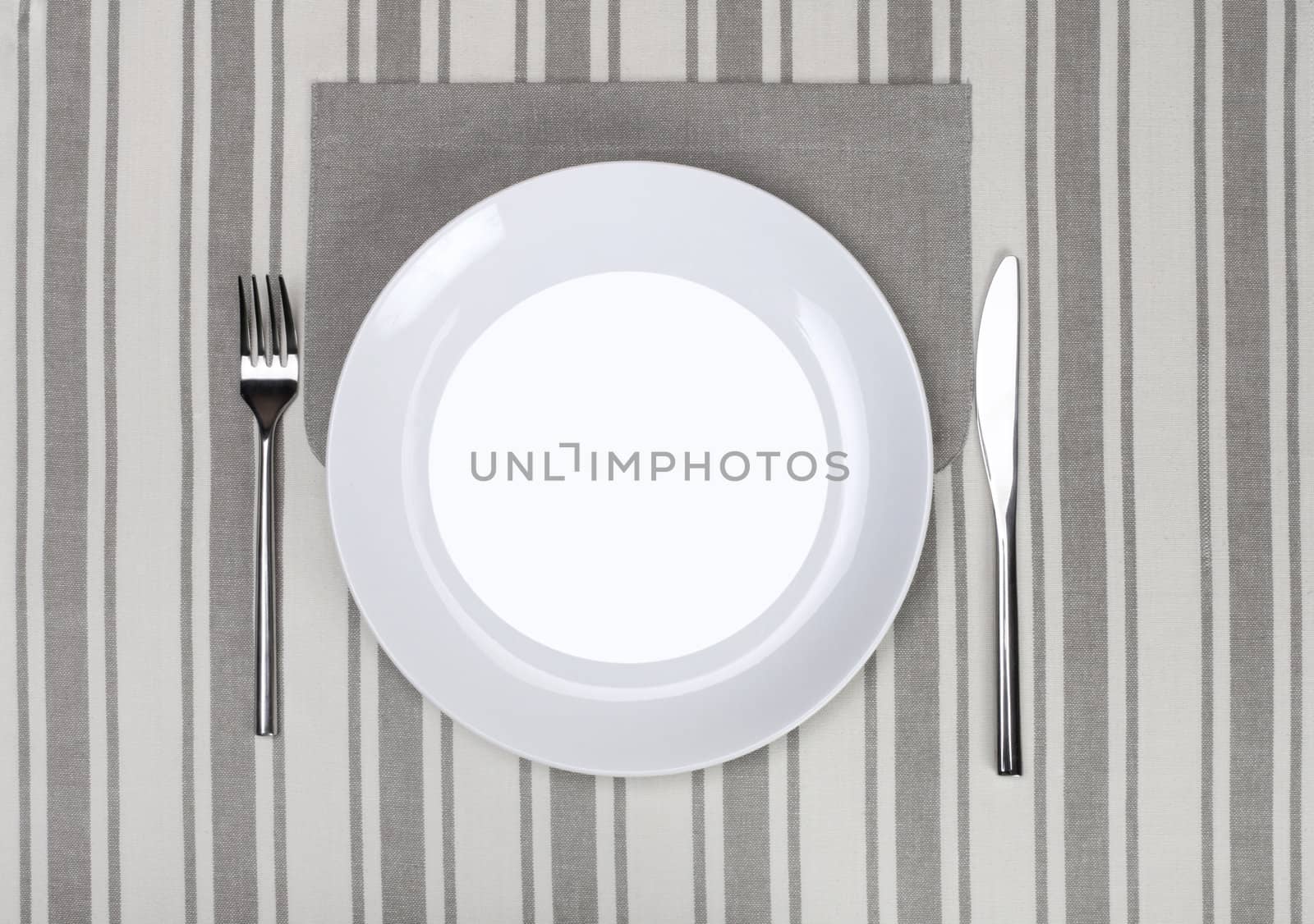 empty plate with fork and knife by rudchenko