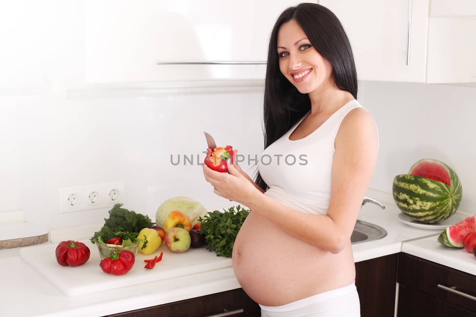 pregnant woman in kitchen