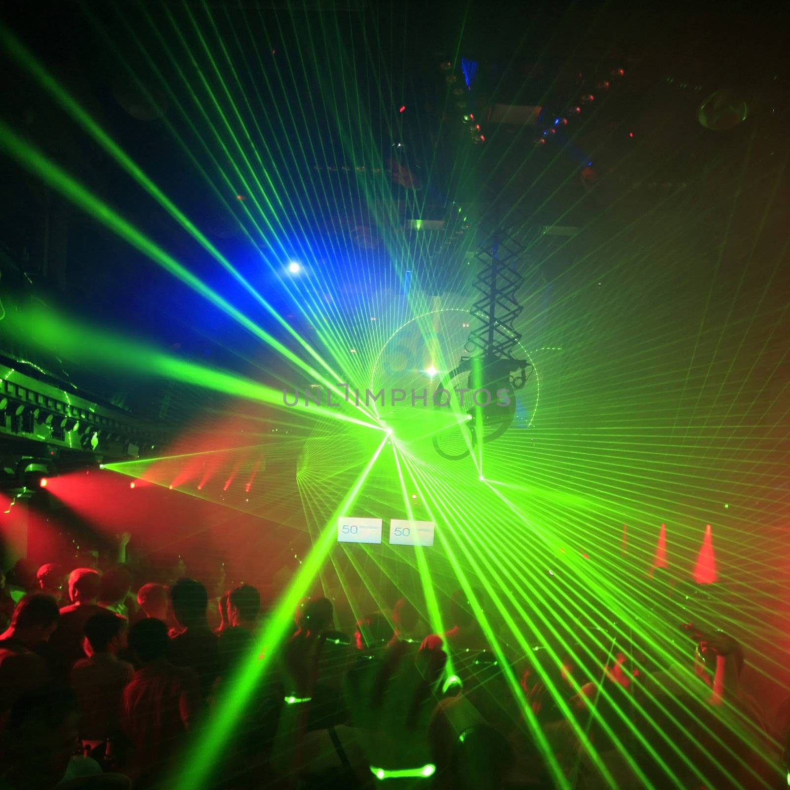 Lolored laser party in entertainment disco club