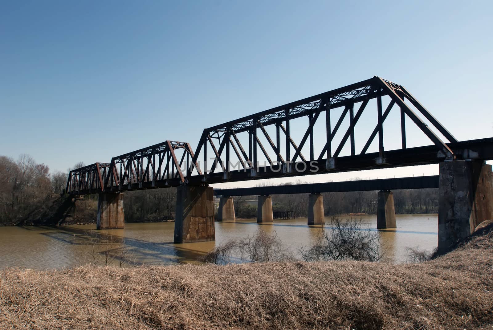 railroad bridge over river by digidreamgrafix