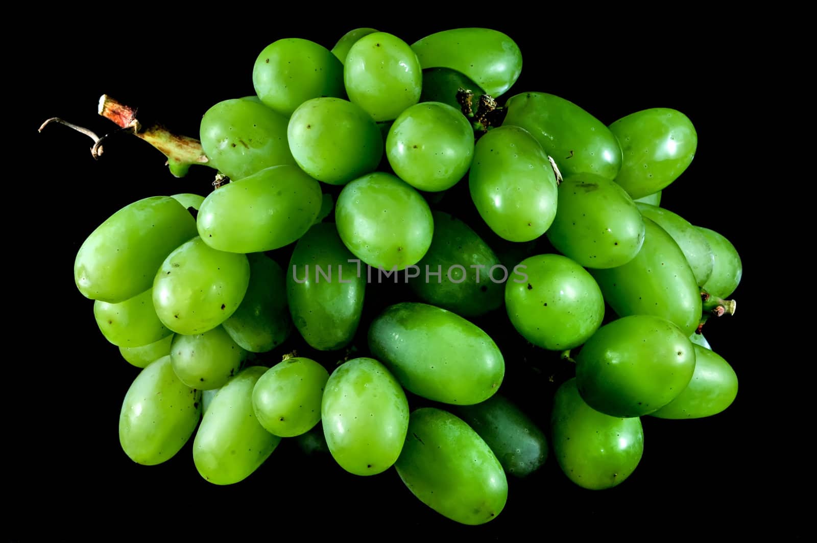 bunch of green grapes on a black background by digidreamgrafix