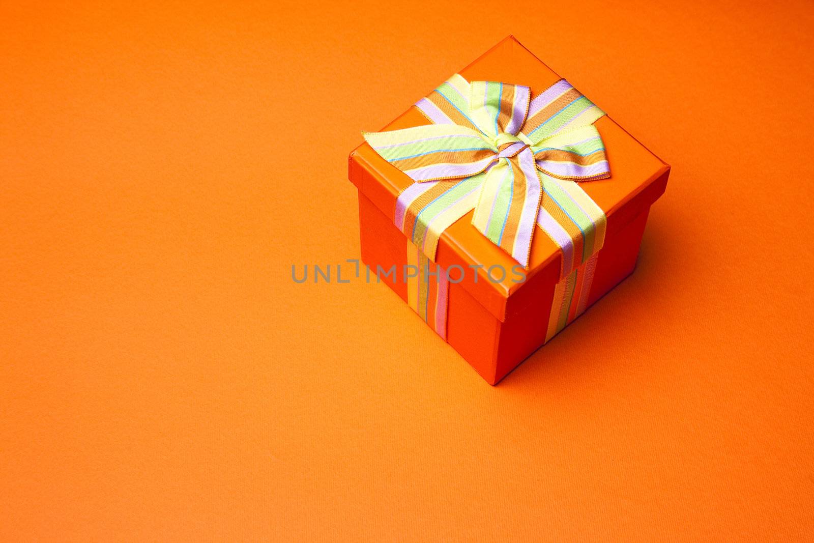 Concept and ideas: Gift Box On Orange Background