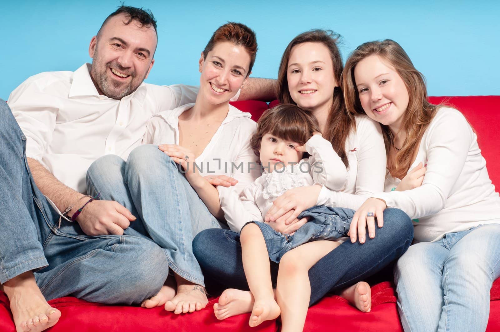 happy family on the couch in the living room