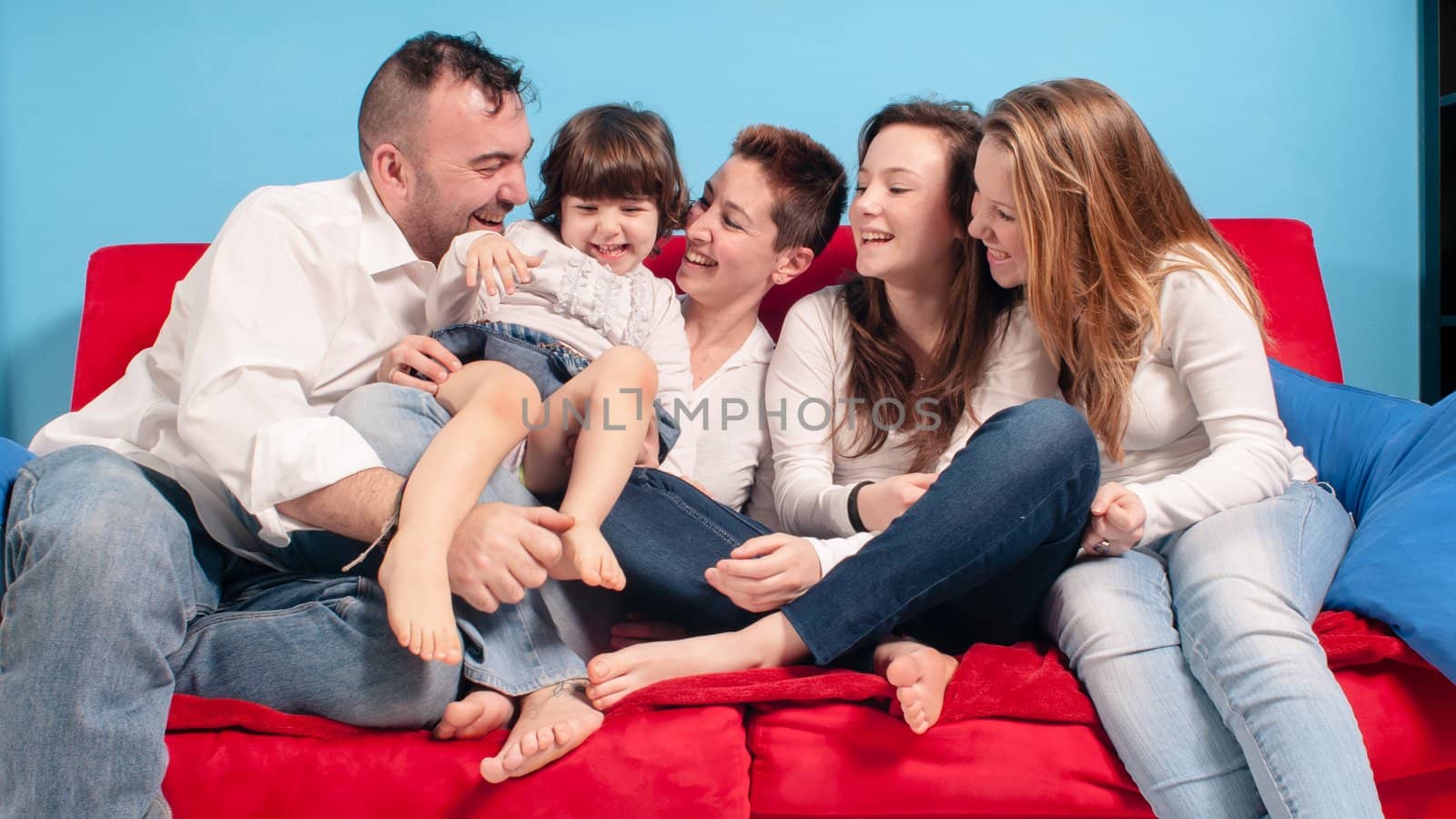 happy family on the couch in the living room