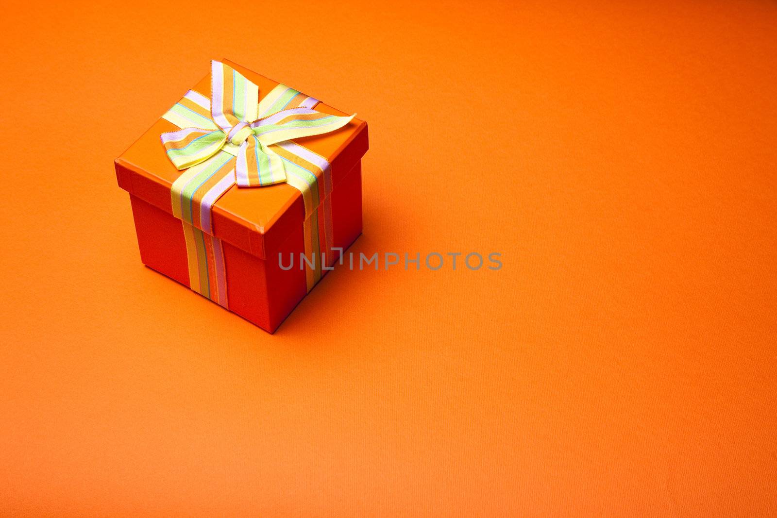 Concept and ideas: Gift Box On Orange Background