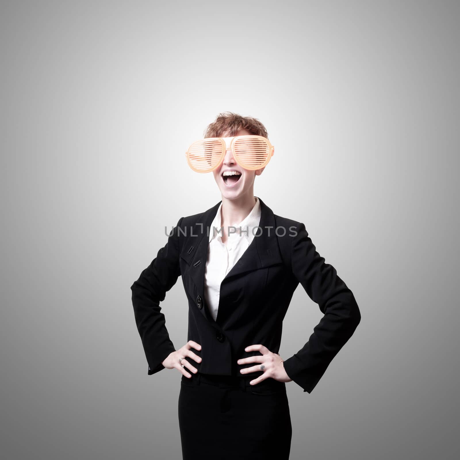 businesswoman with big funny eyeglasses screaming  by peus