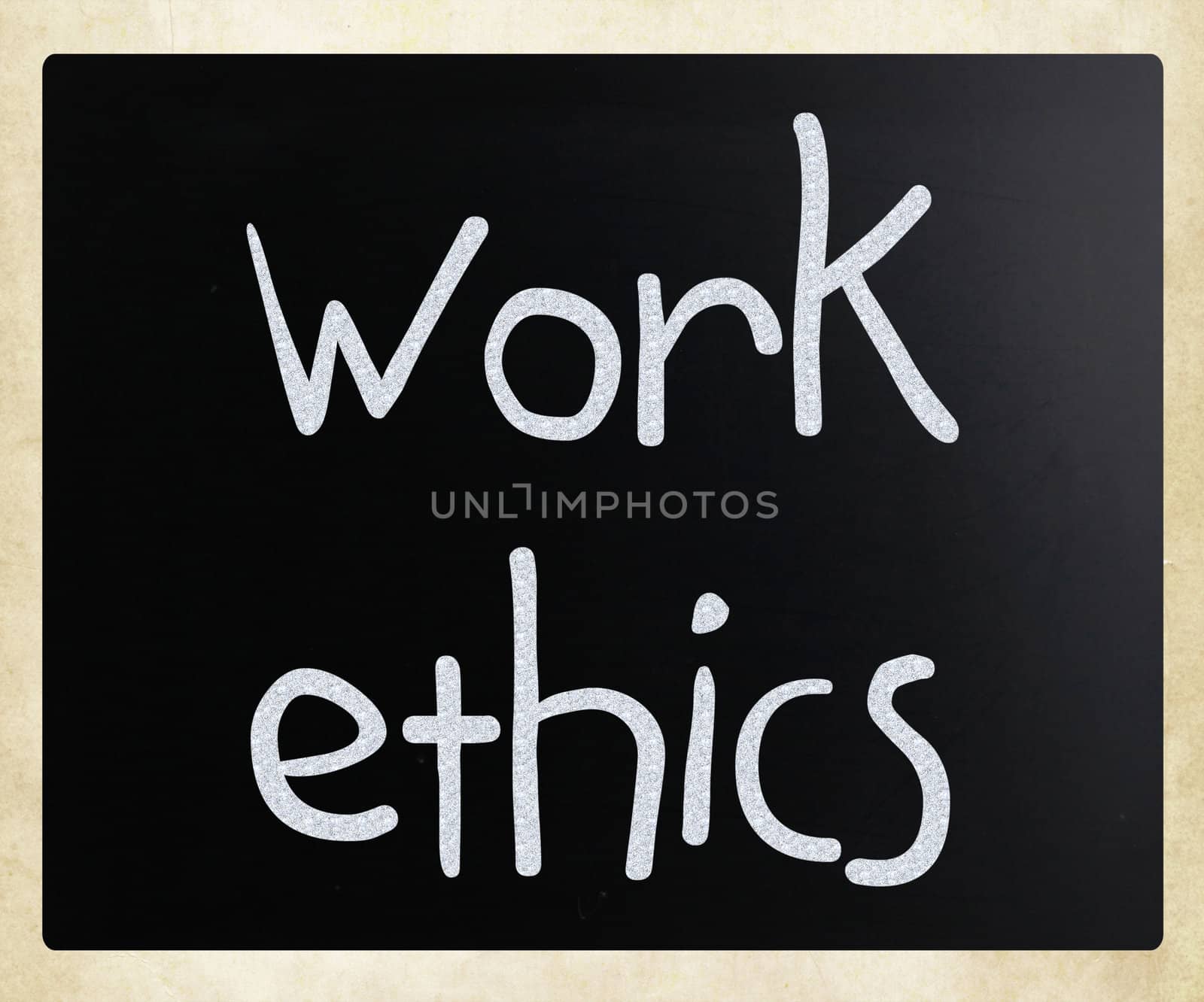 "Work Ethics" handwritten with white chalk on a blackboard