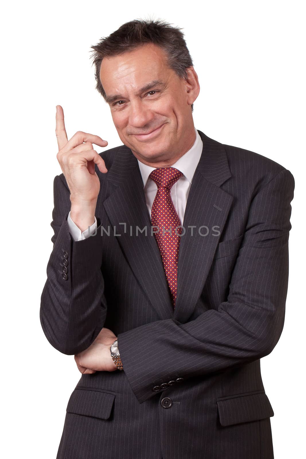 Attractive Smiling Middle Age Business Man in Suit Pointing Upwards Isolated