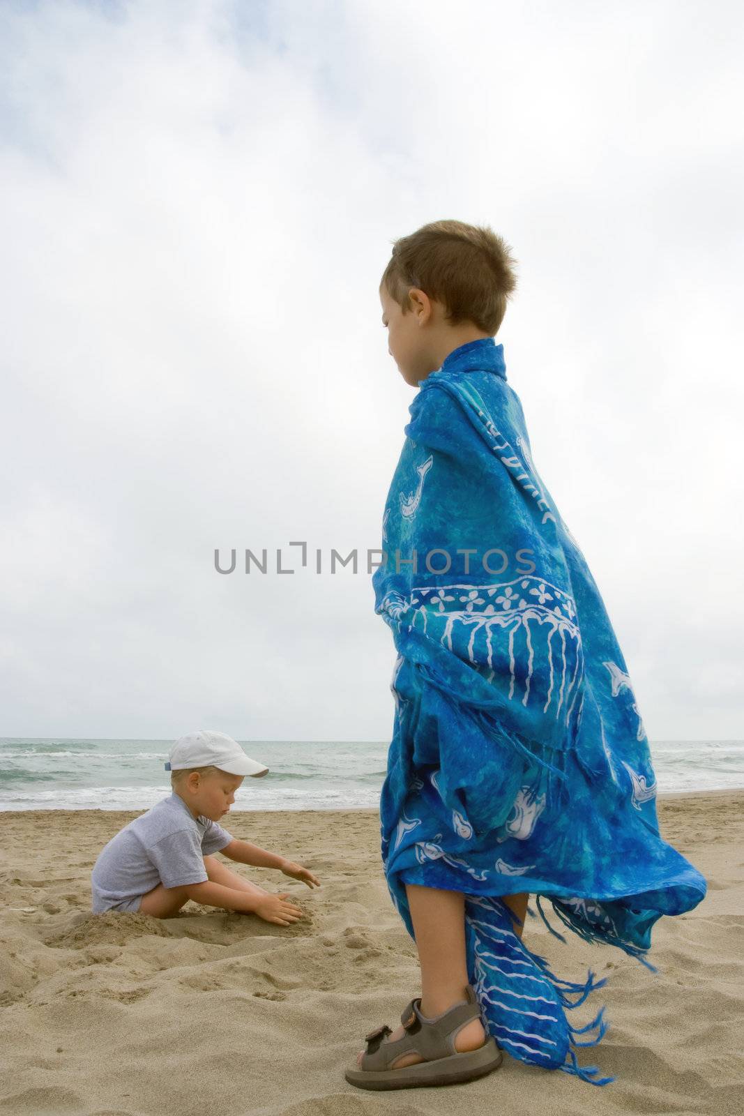 children on the beach by chrisroll