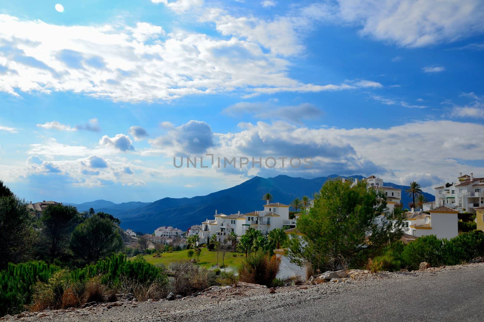 view from the mountain road leading over the city mijas