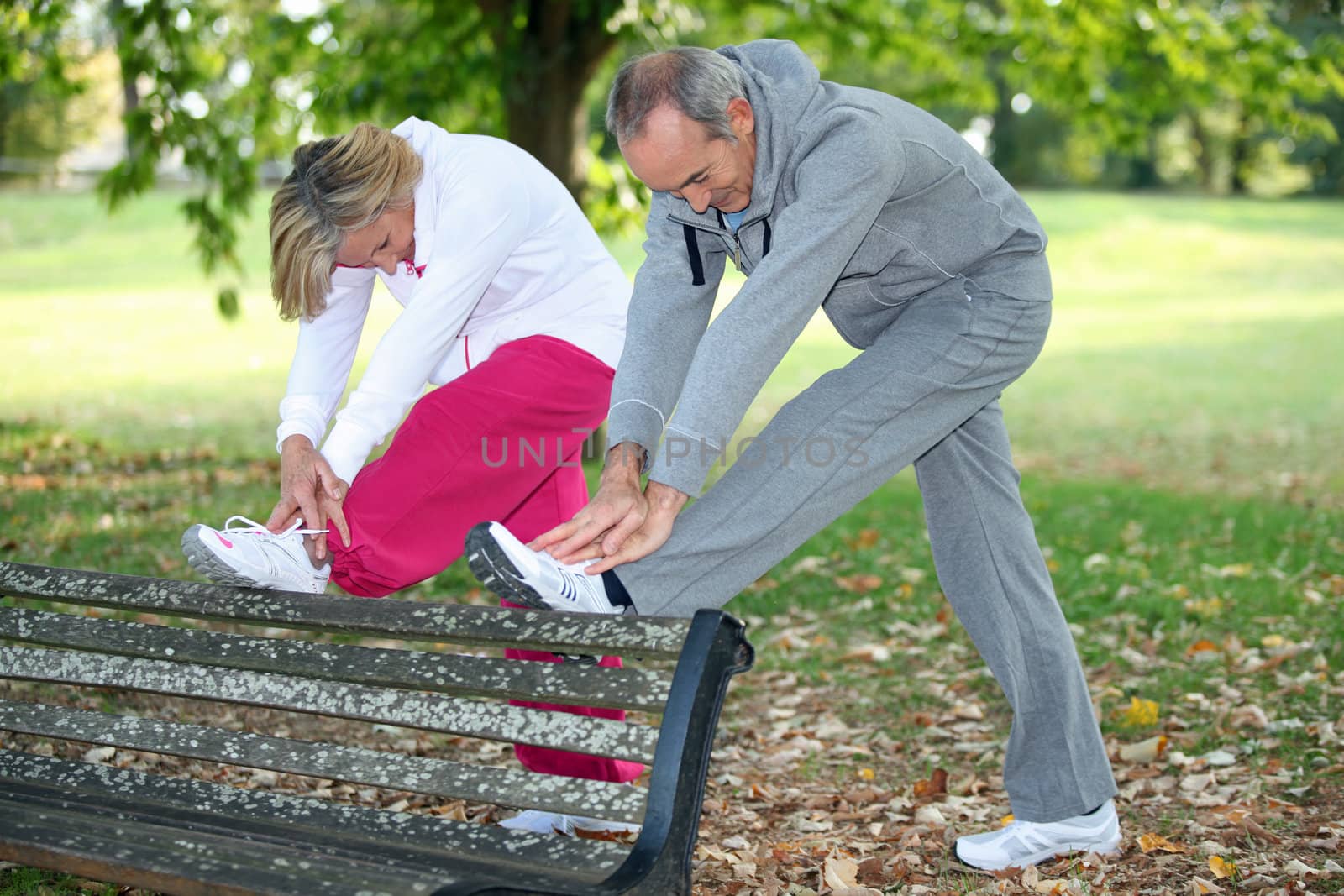 Couple stretching before run