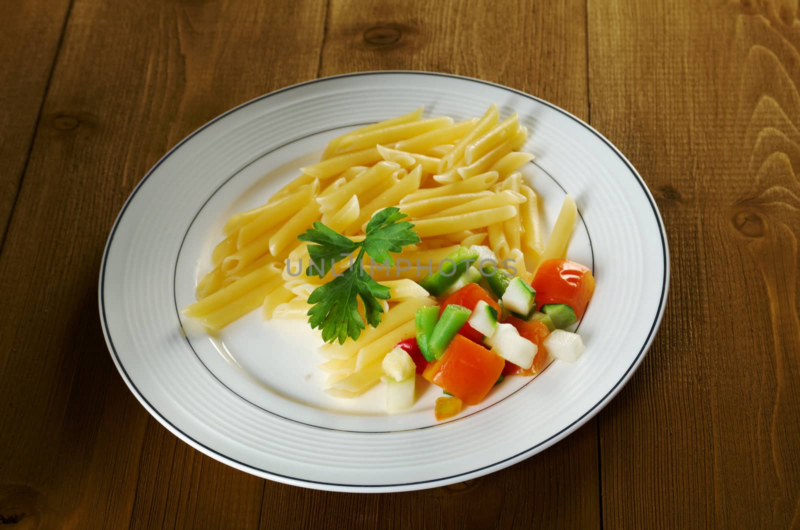 delicious macaroni pasta on wooden table
