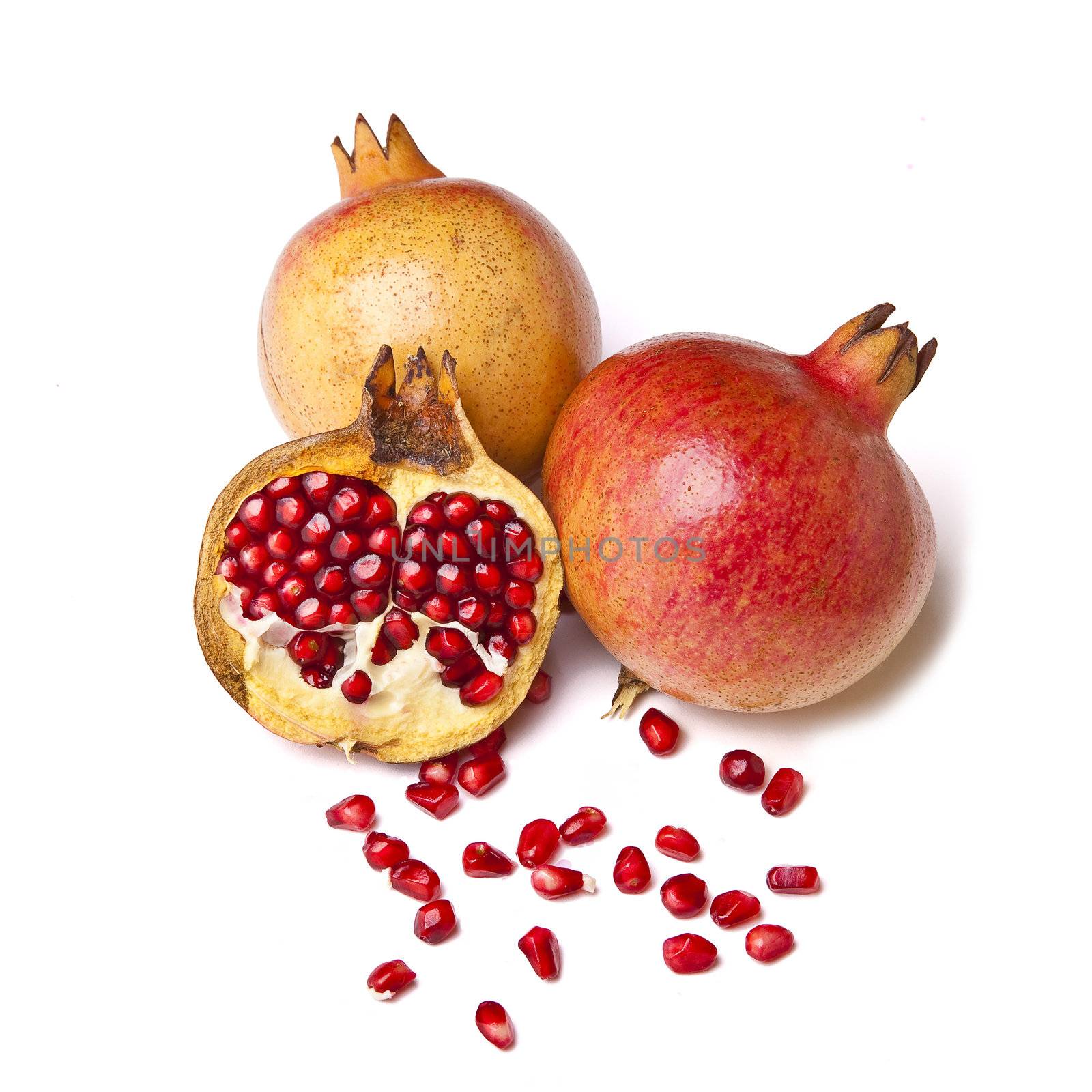 Pomegranate on white background, fruit - organic food