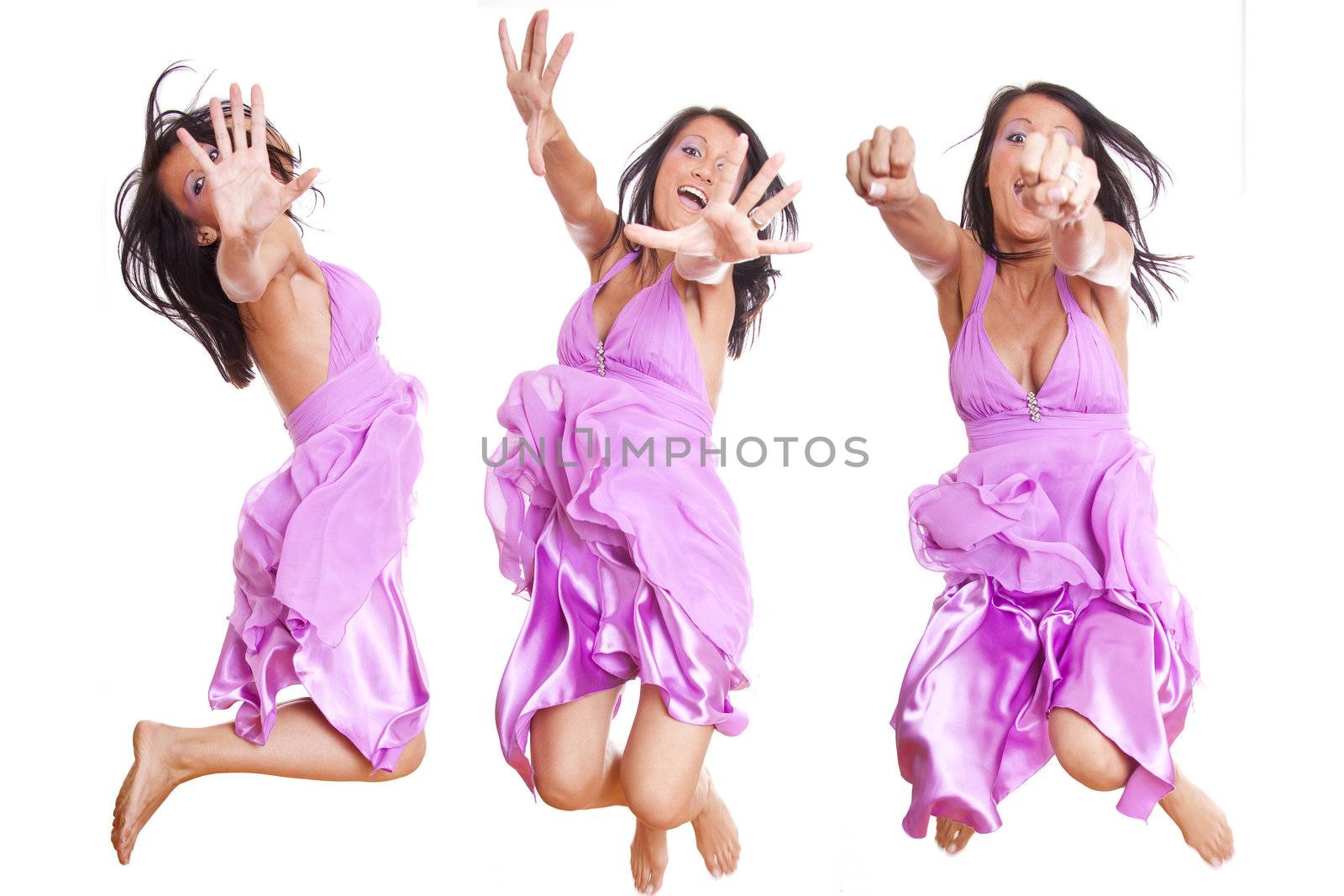 Woman In Violet Silk Dress Jumpin, isolated on white