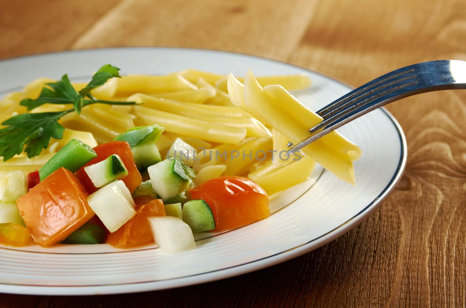 delicious macaroni pasta on wooden table
