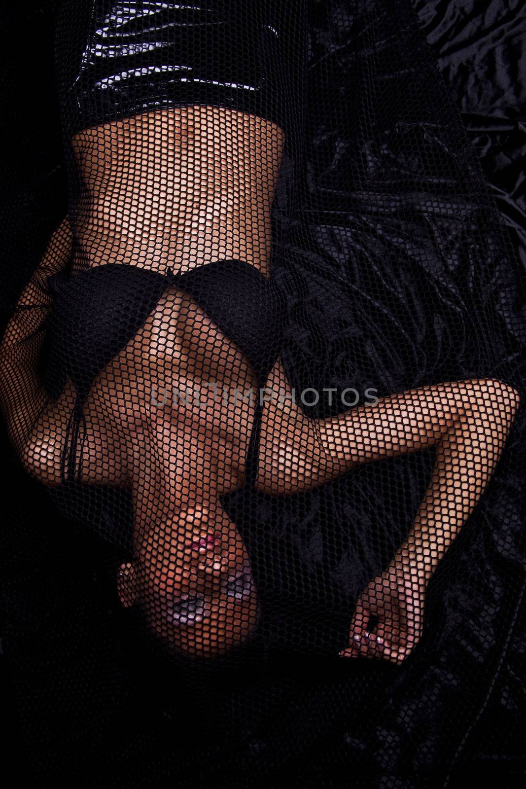 Woman Trapped In Black Fishnet by adamr
