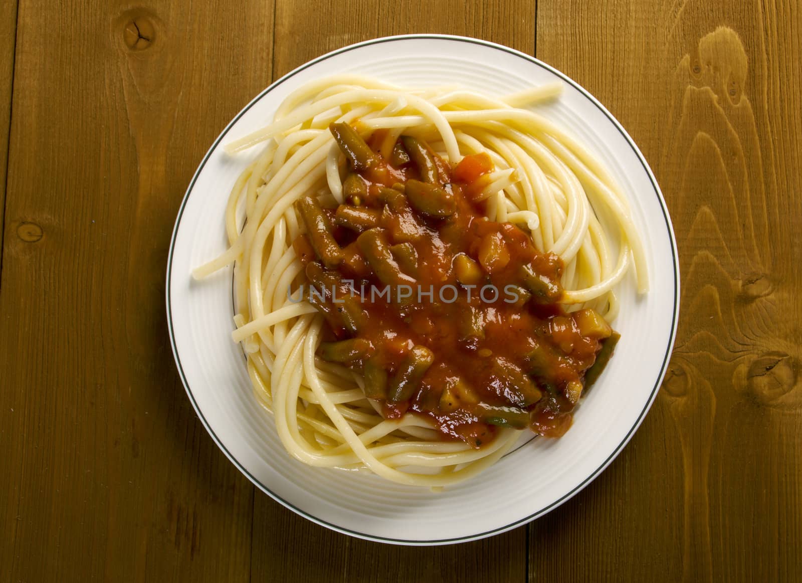  pasta with tomato  sauce  on wooden table