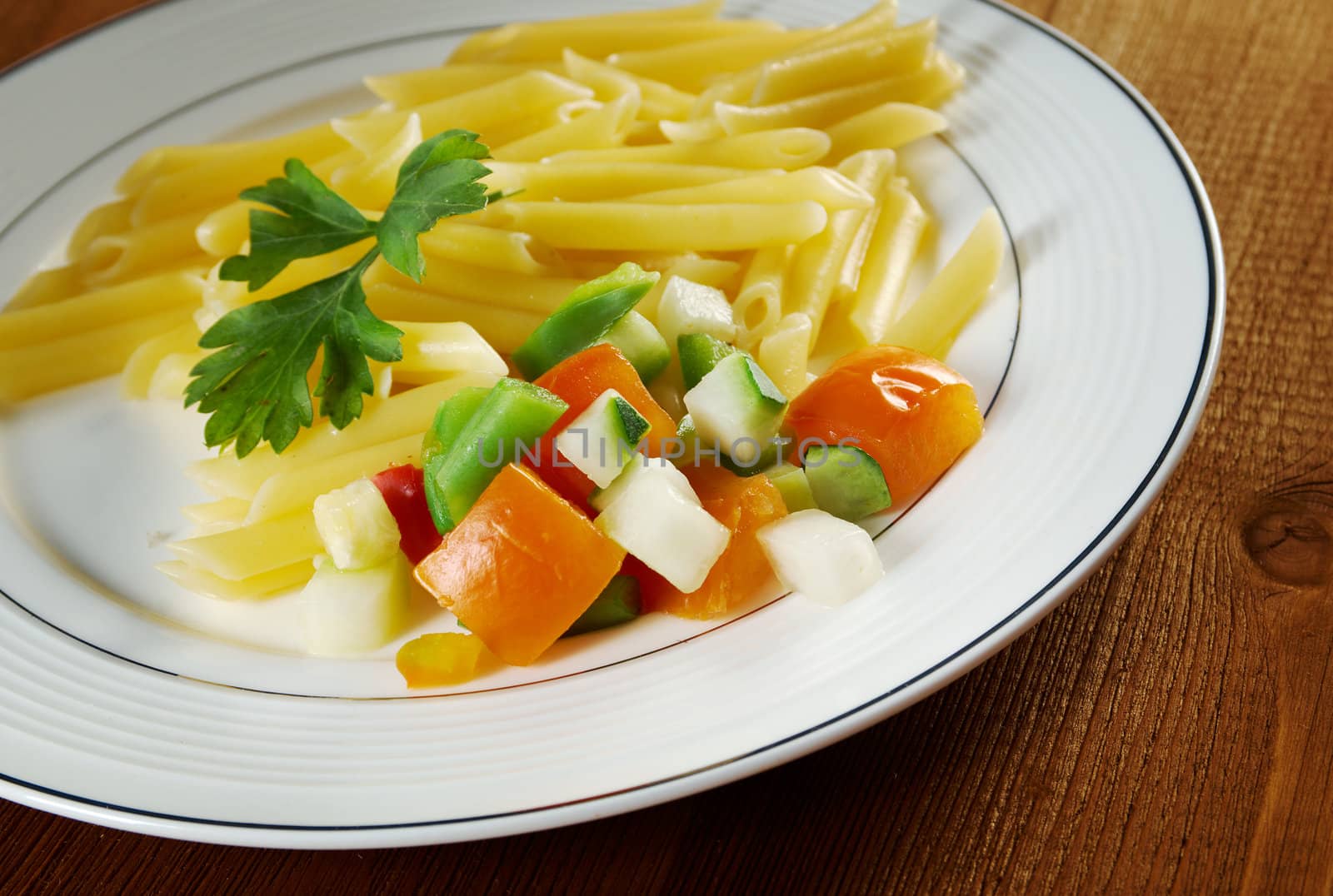 delicious macaroni pasta on wooden table