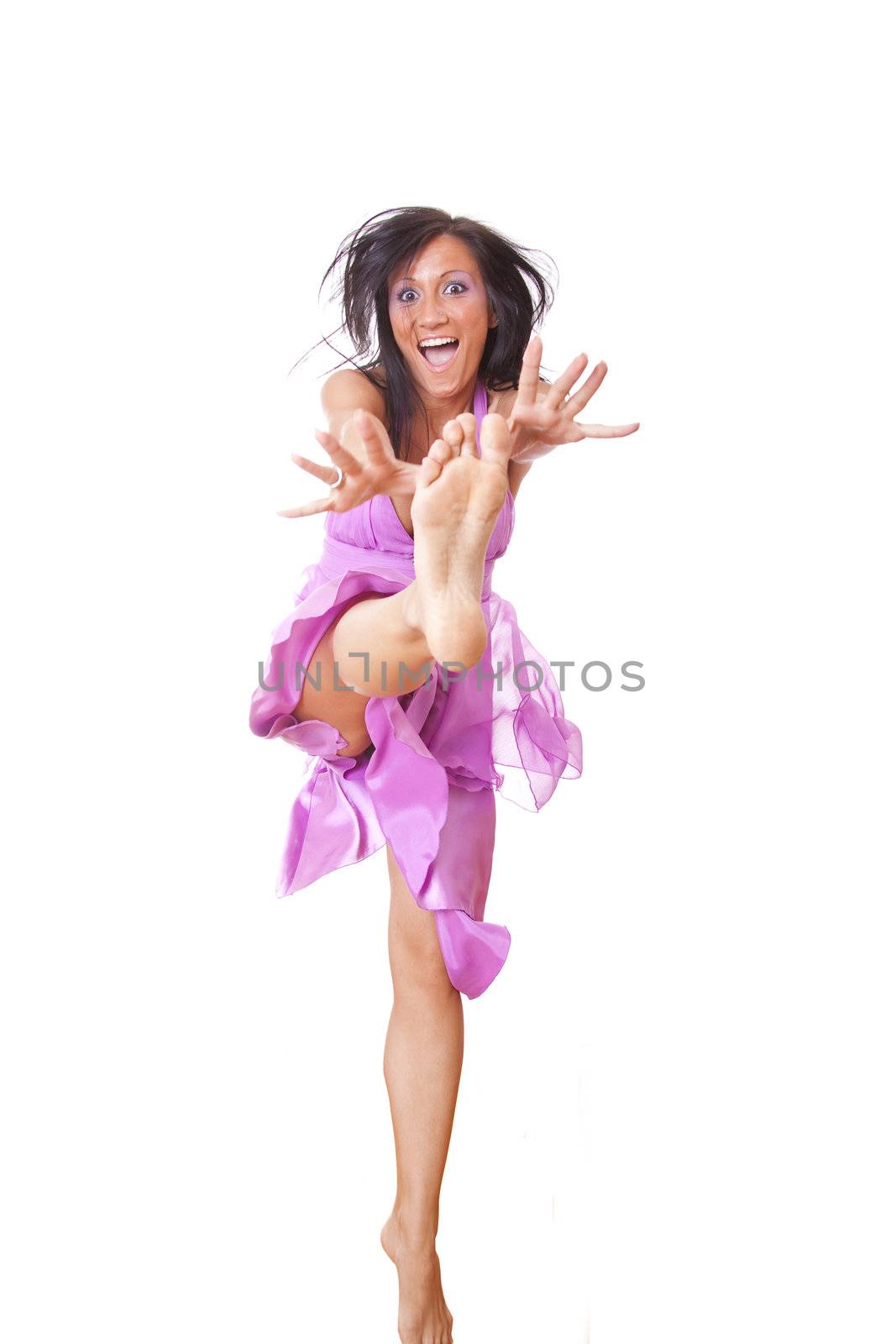 Smiling Woman In Violet Silk Dress Jumping by adamr