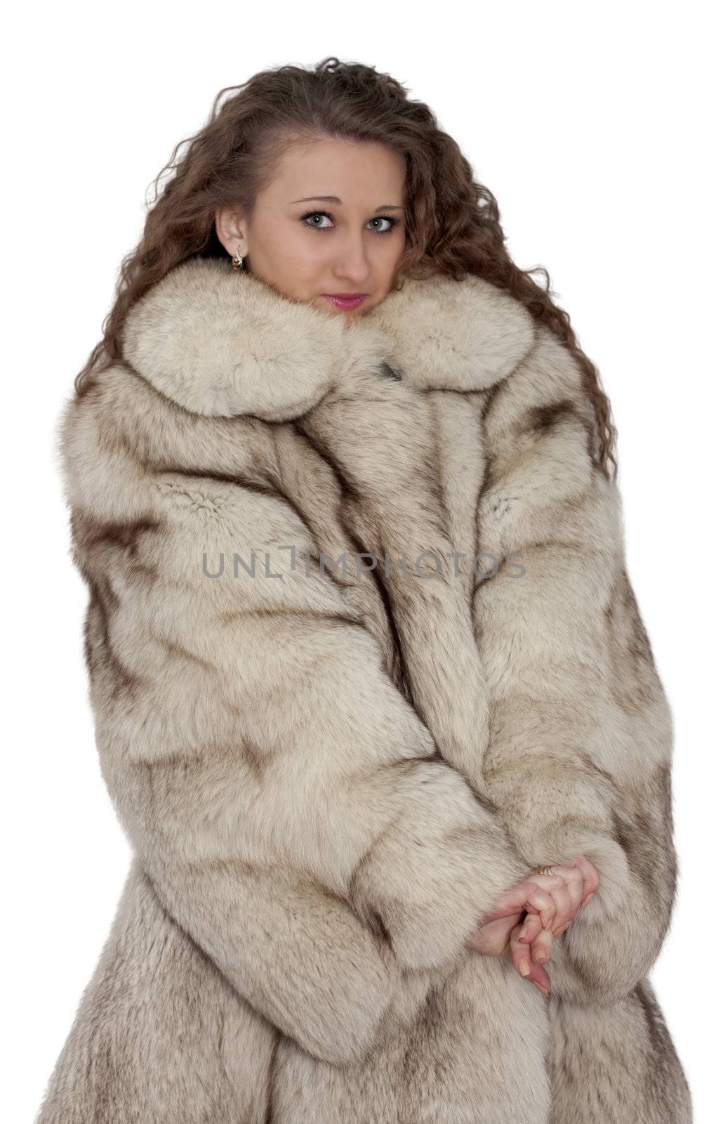 girl in a fur coat on a white background