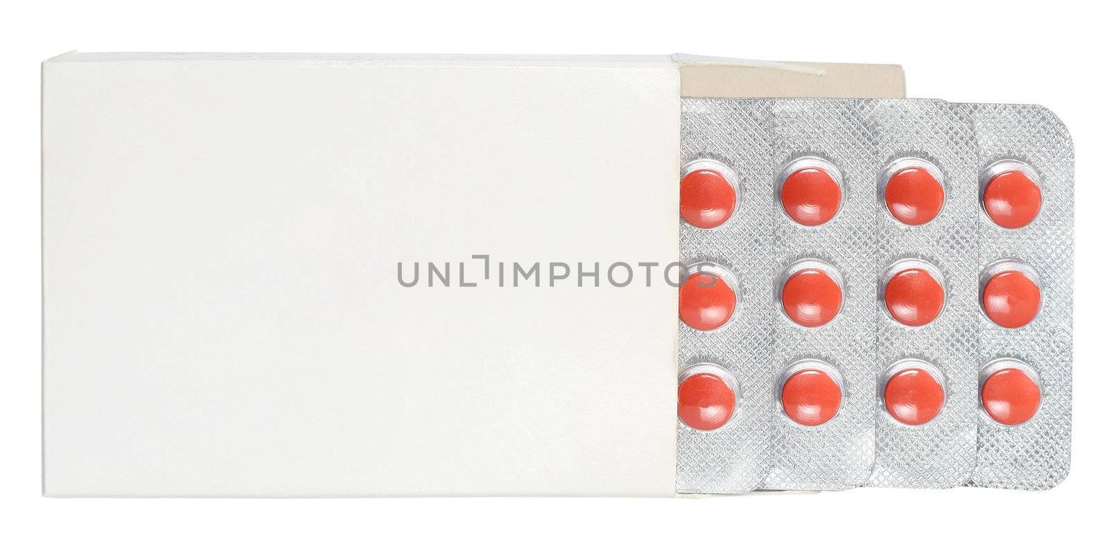 Pills in a box on a white background.