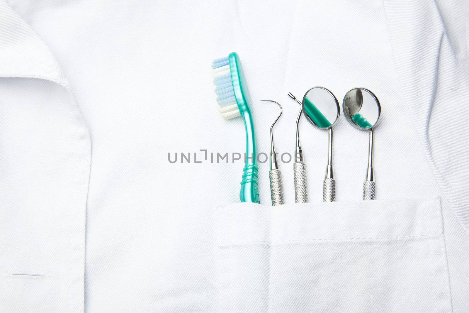 White Dentist Pocket With Toothbrush And Angled Mirror