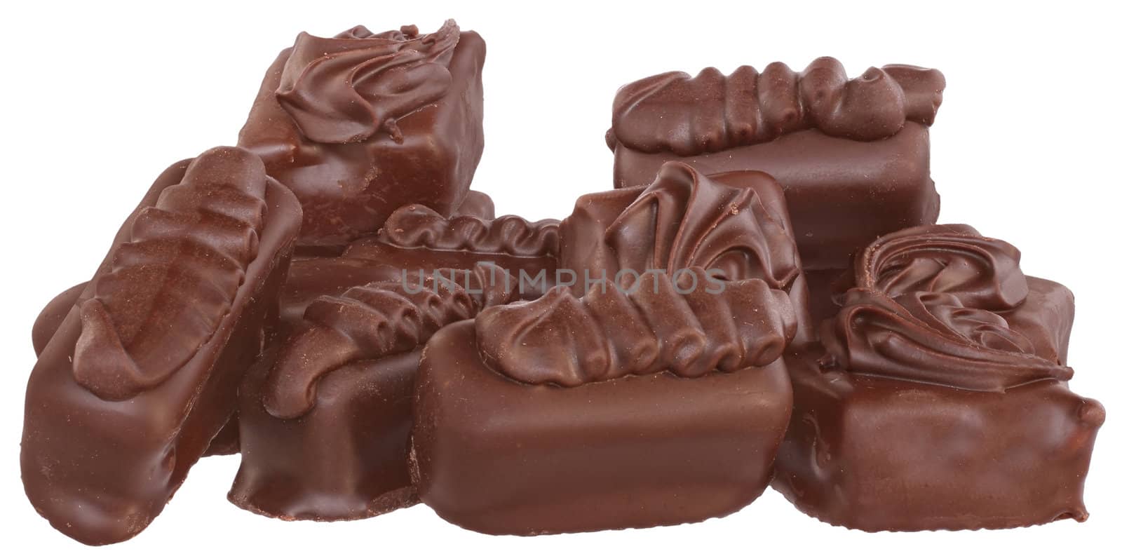 The chocolate sweetmeats on white background.