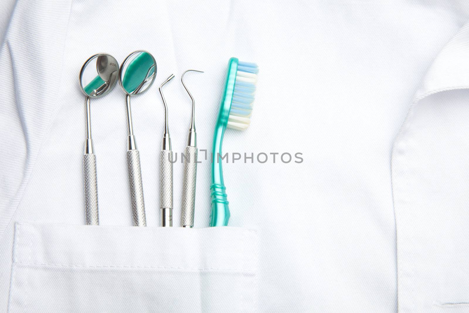 White Dentist Pocket With Toothbrush And Angled Mirror
