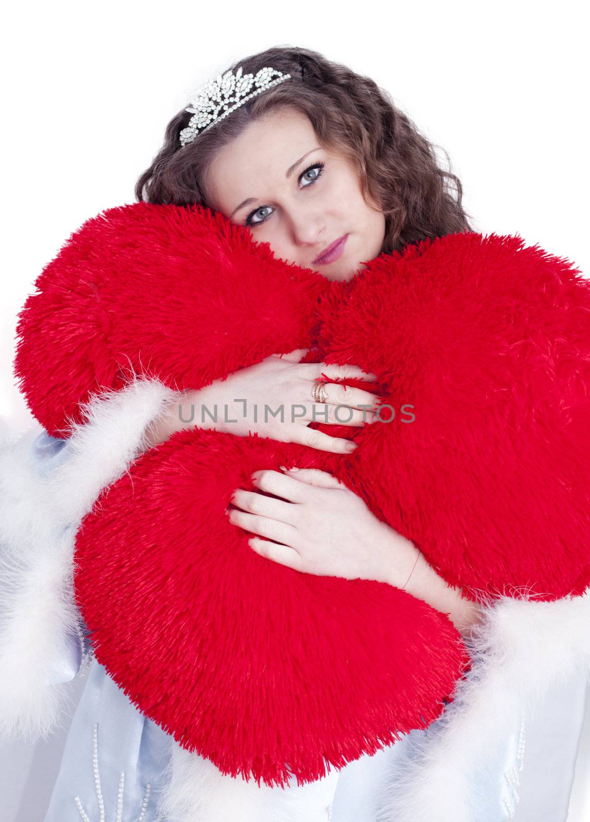 Girl hugs heart on a white background
