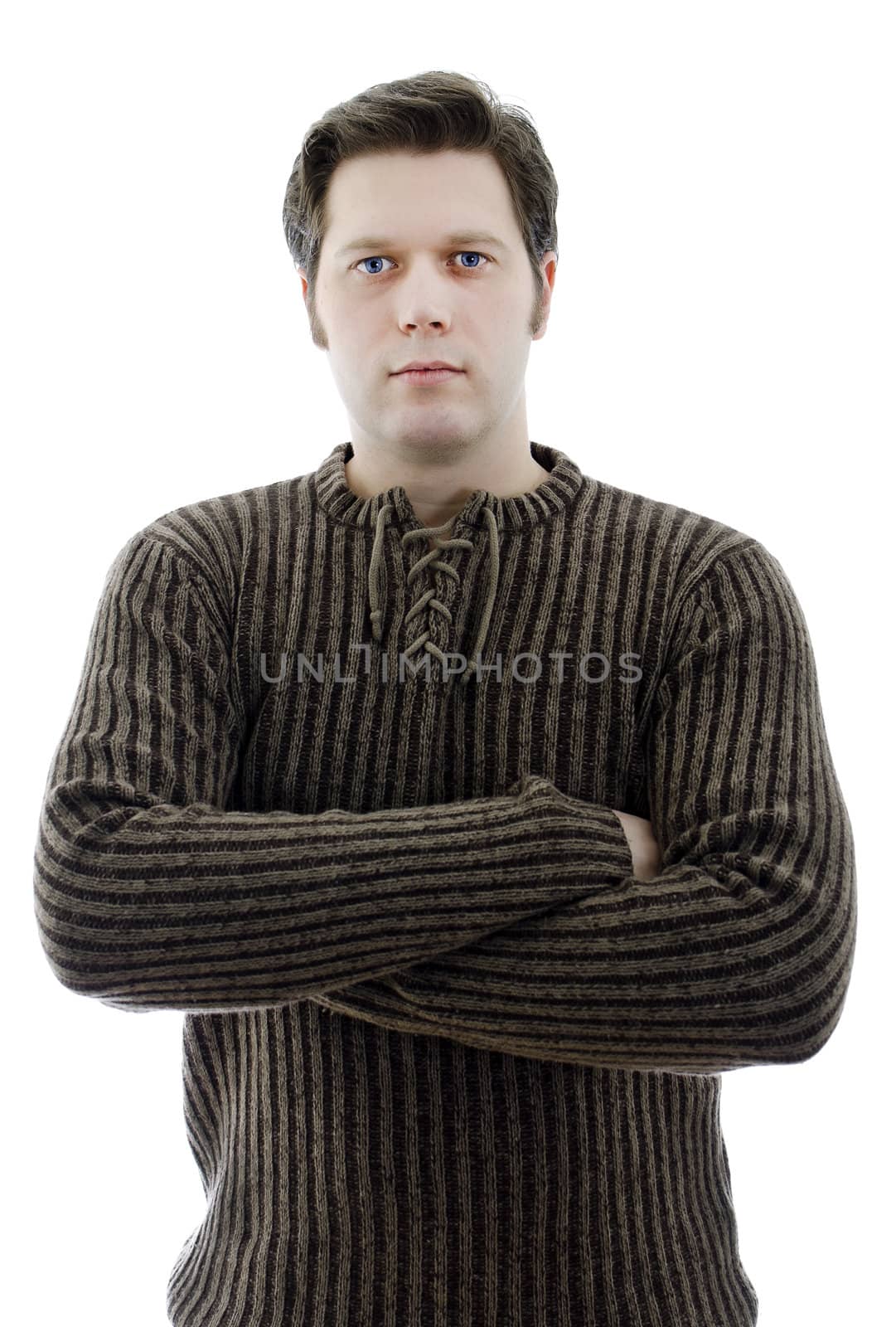 Man in a woolen sweater with arms crossed. Isolated on white.