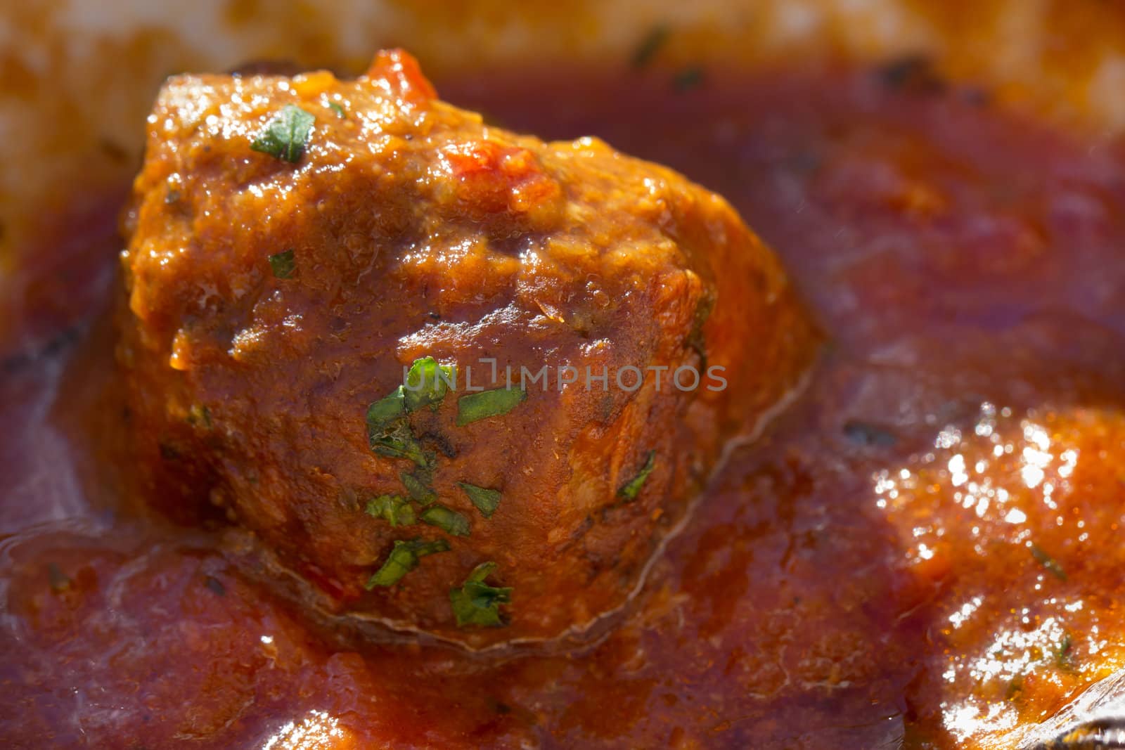 Picture of a spice meatball in sauce