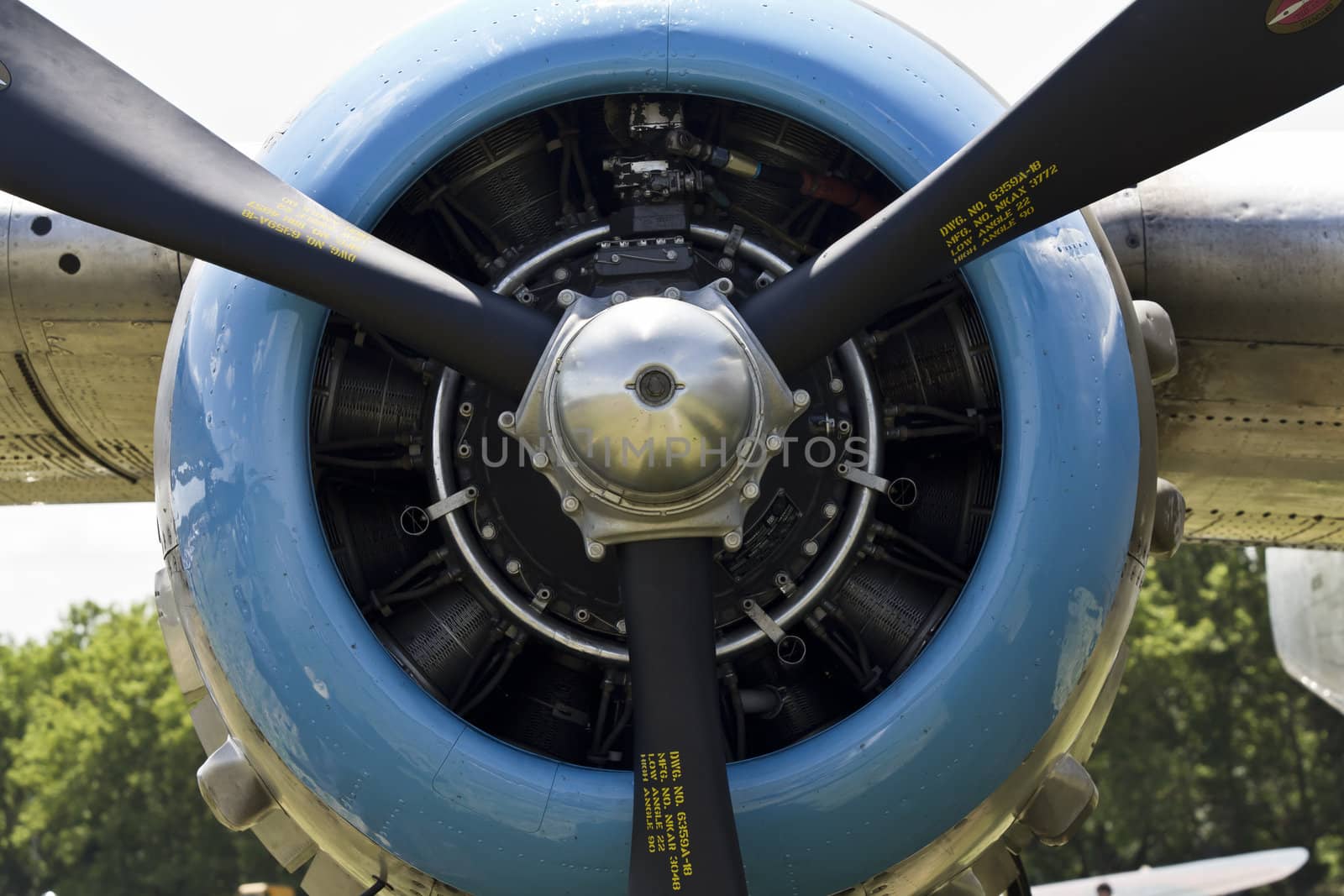 close-up of a small aircraft engine and propeller.