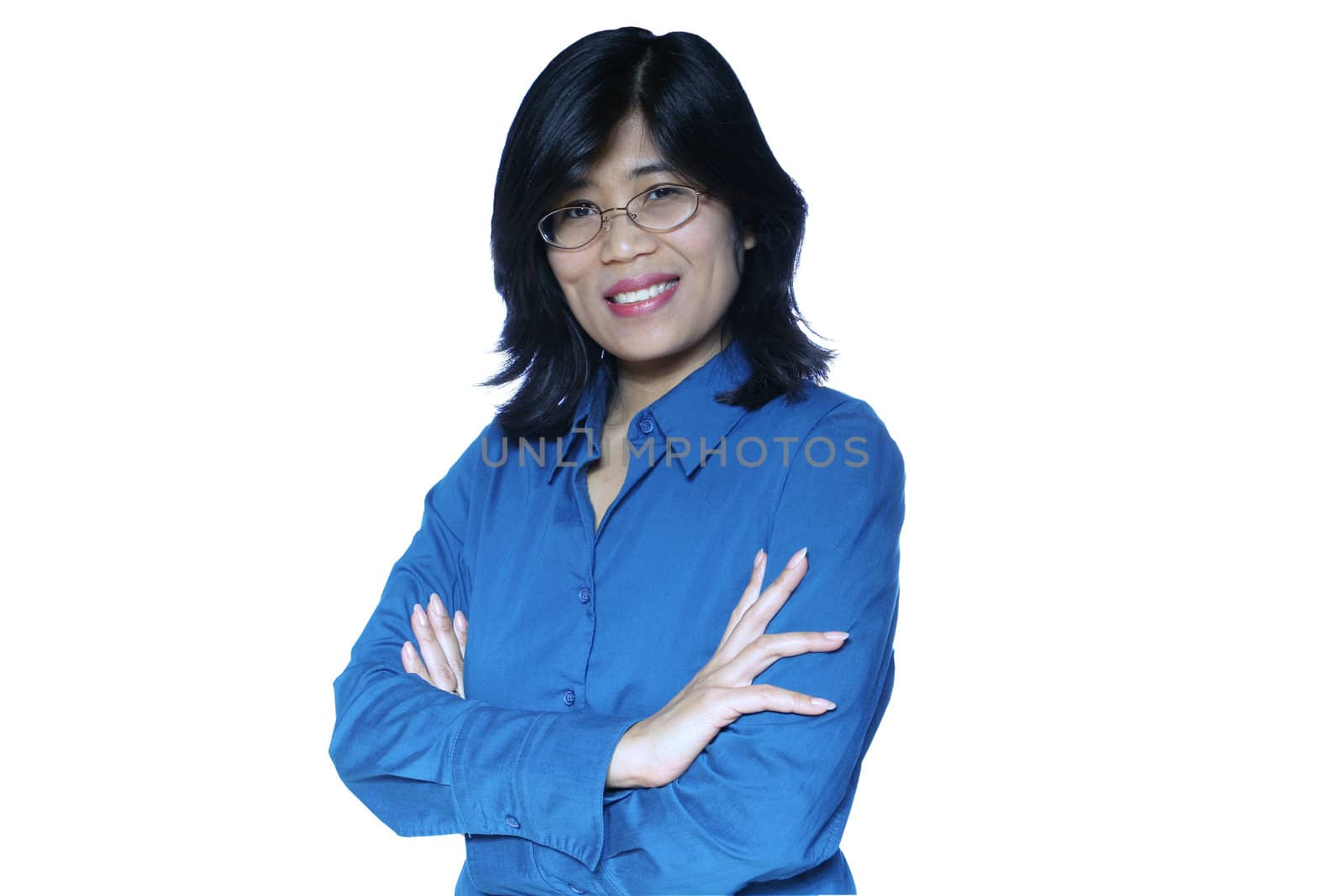 Asian business woman standing with arms crossed