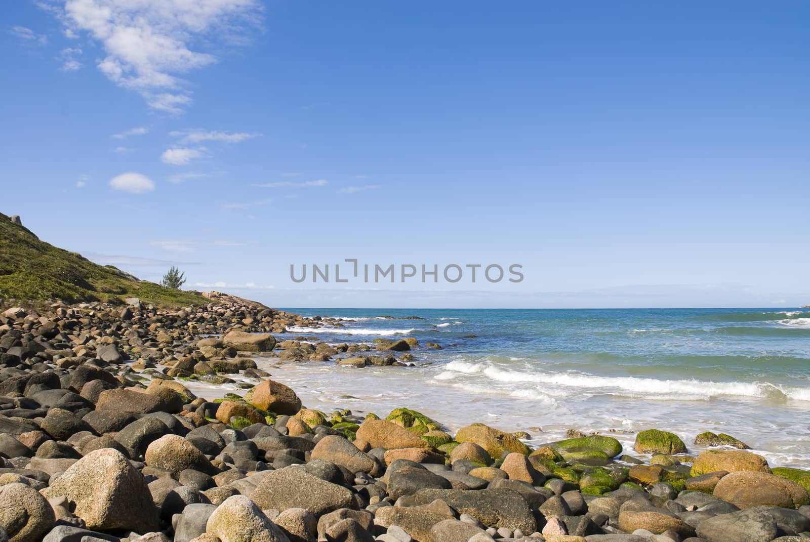 Deserted tropical coastline, with loads of copy space.