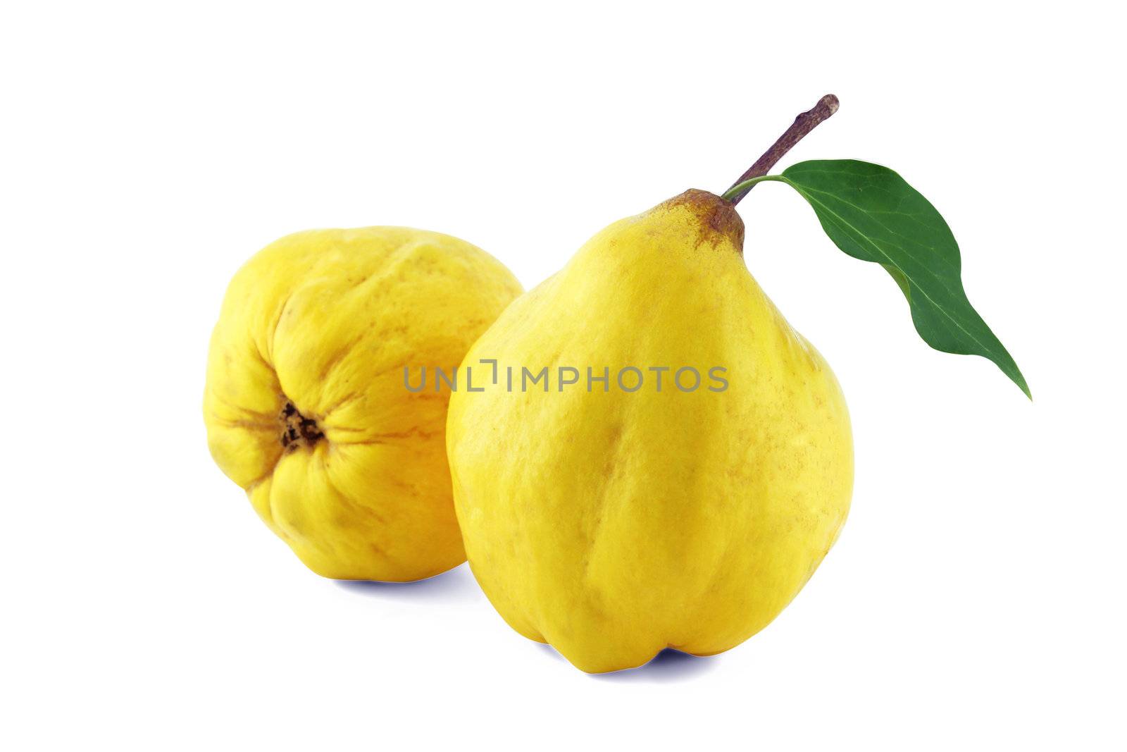 sweet quinces with leaves and slice on white with a clipping path