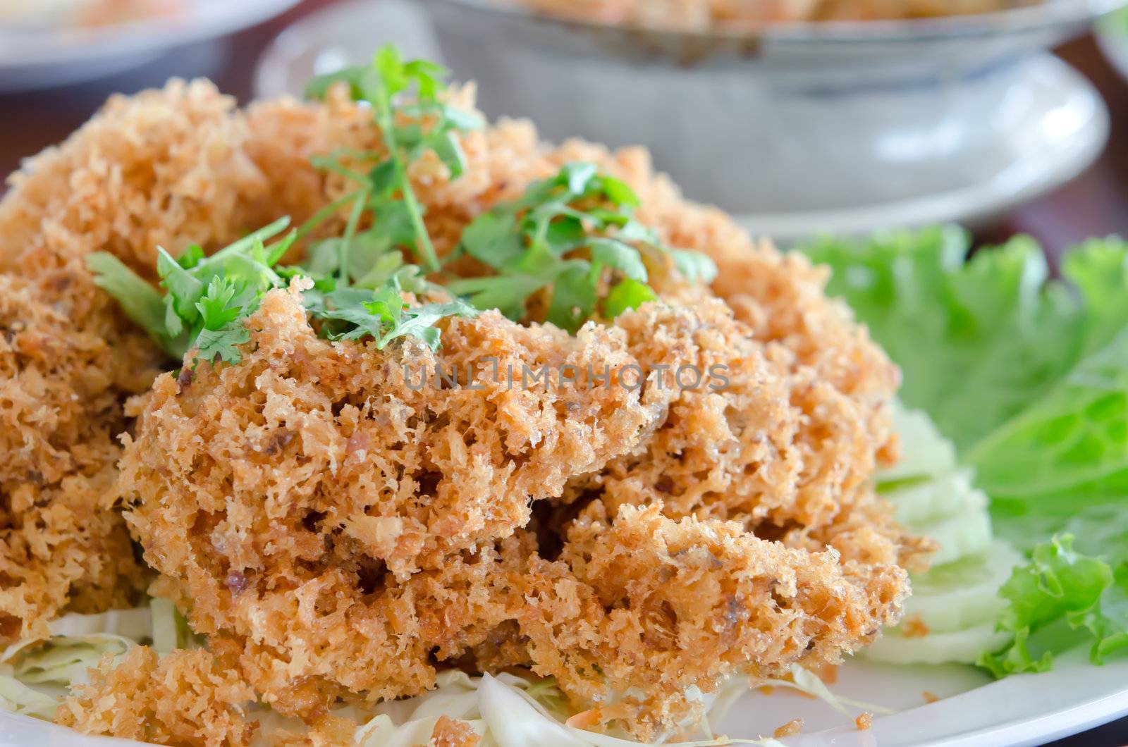 crispy catfish served with fresh vegetable  . Thai food