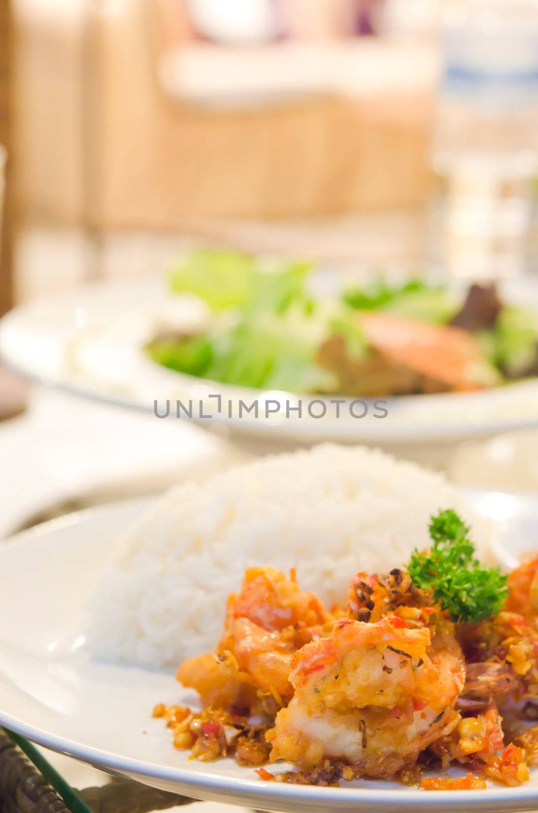 deep fried shrimp with chili sauce , served with steamed rice