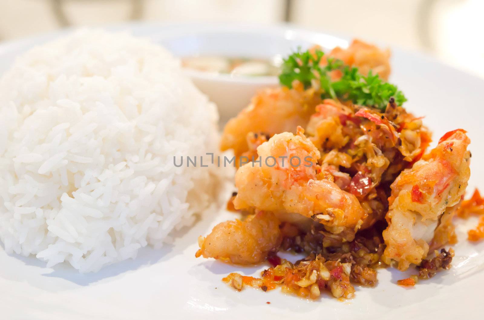 deep fried shrimp with chili sauce , served with steamed rice