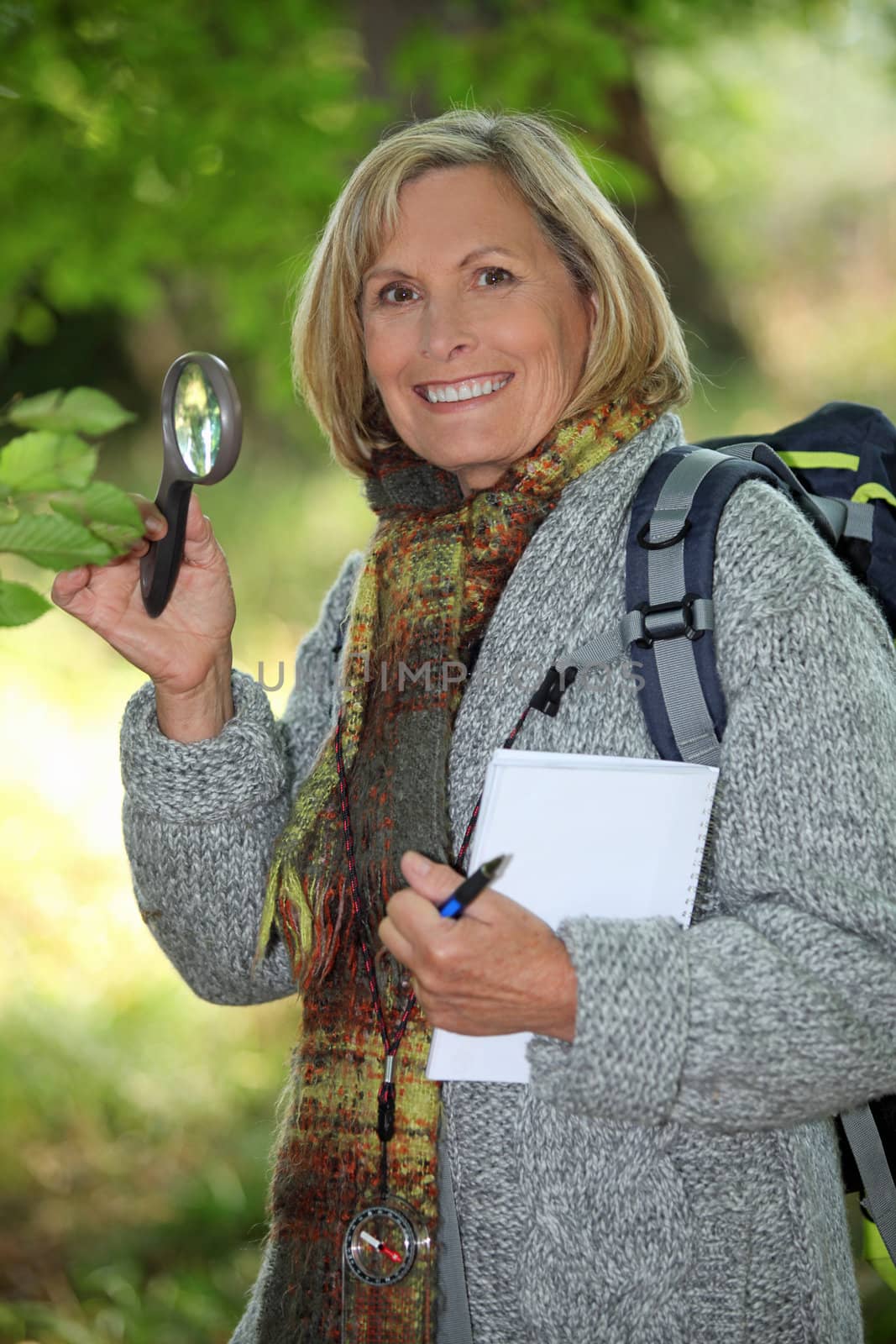 Woman on a nature trail by phovoir