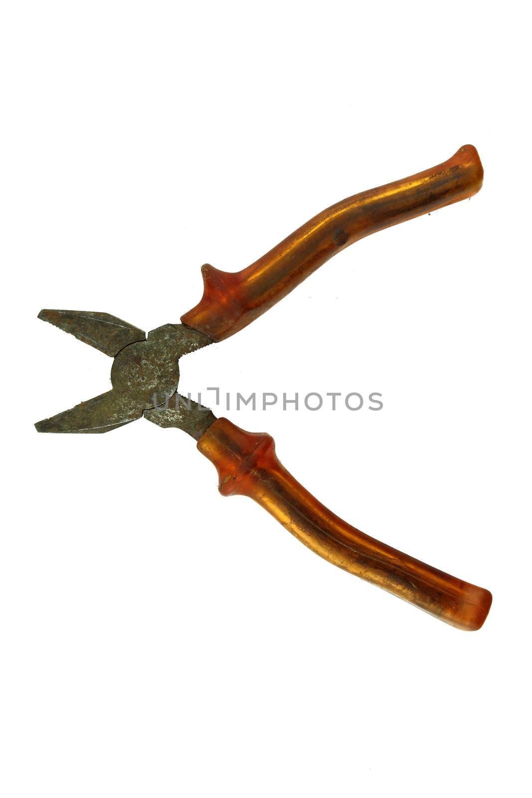 used old Metal pliers with red grips isolated on white background with a clipping path