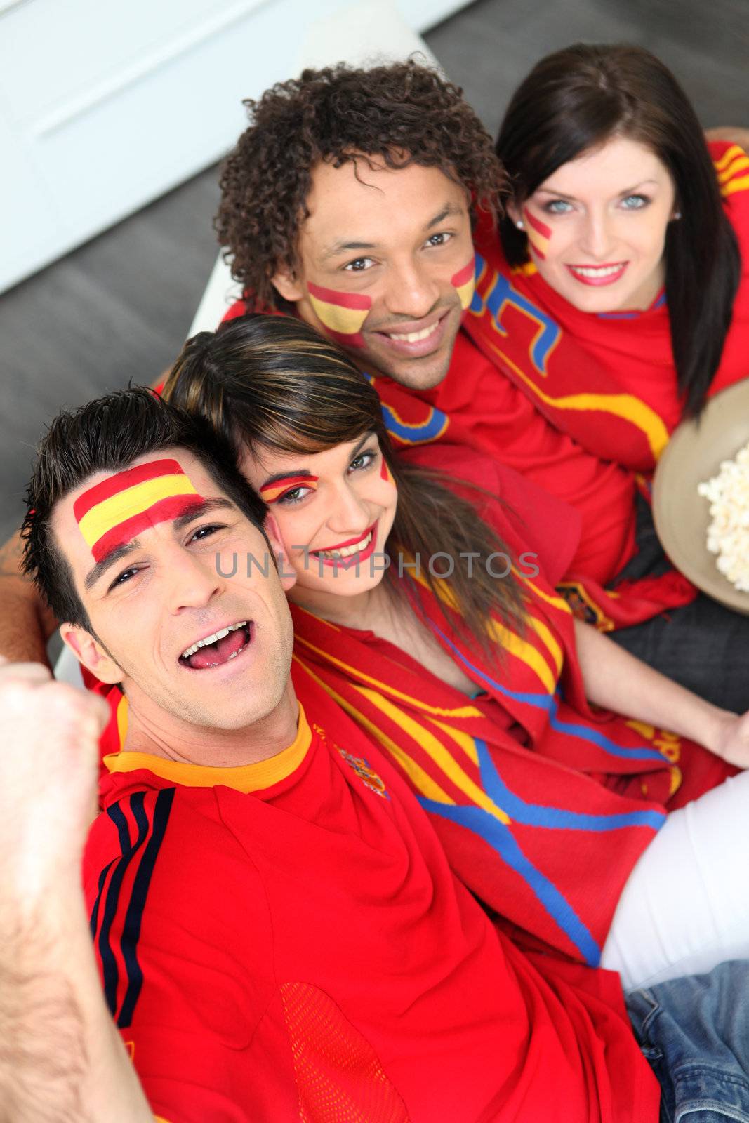 Spanish football fans at home by phovoir