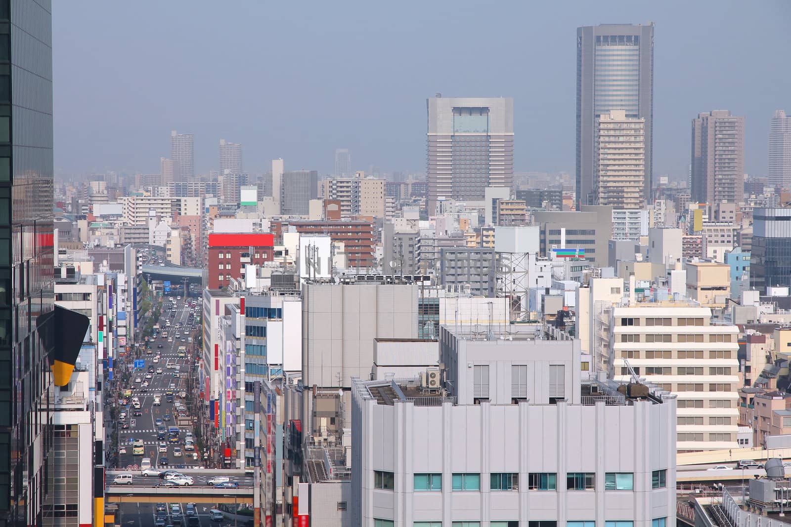 Osaka, Japan - skyline of famous city in the region Kansai. Modern metropolis.